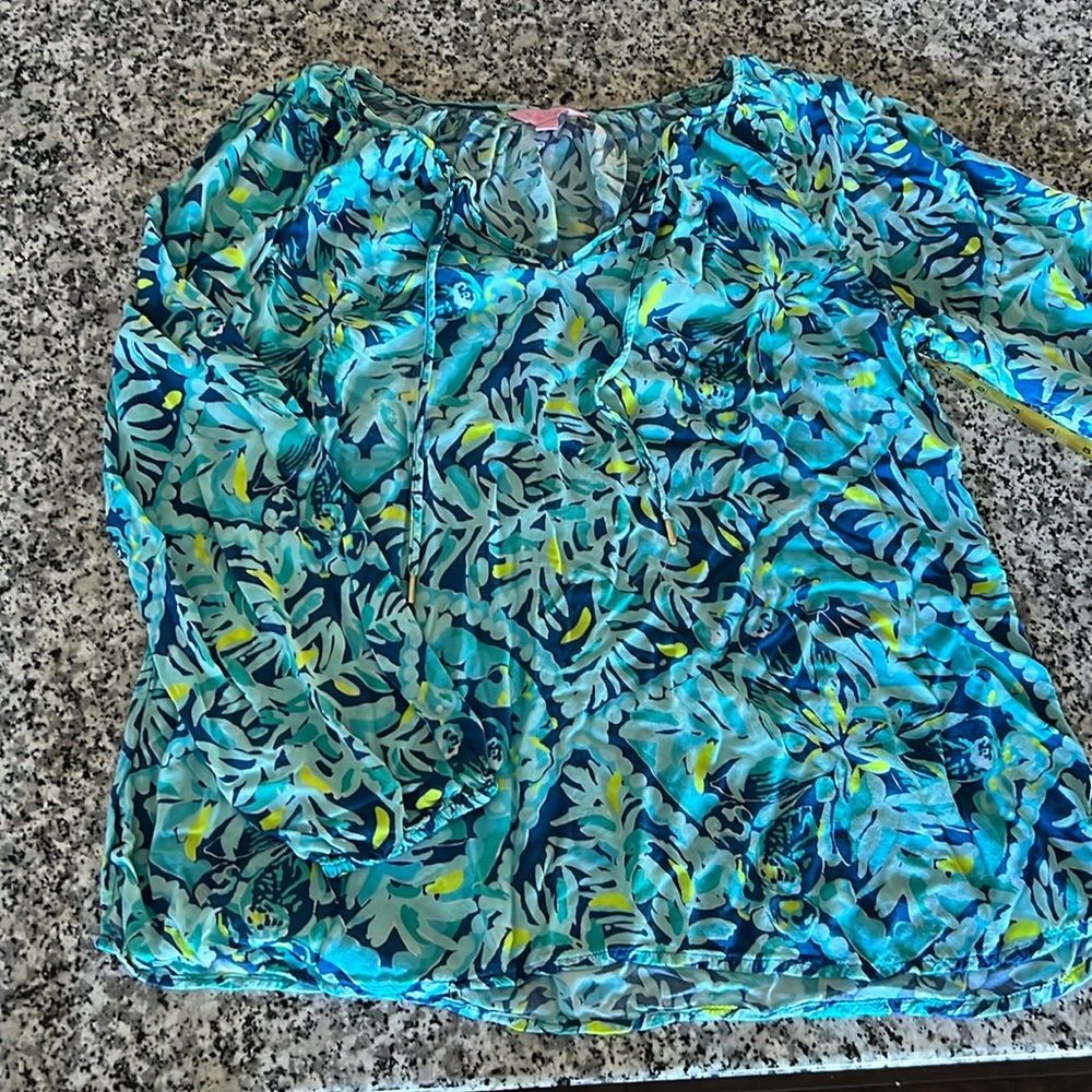 EUC- large tunic.  Colors or blue and a bit of yellow and white